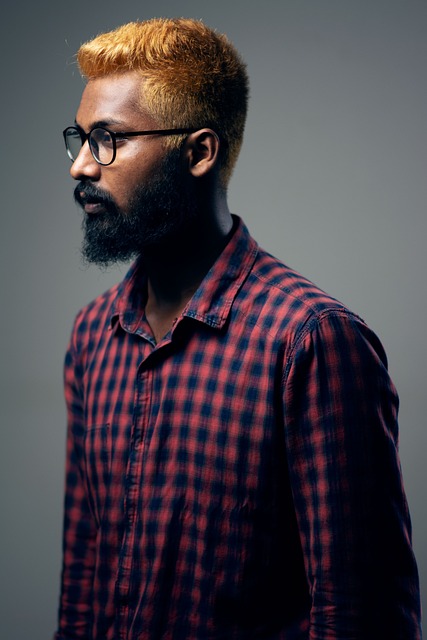 Picture of a man in plaid shirt with copper hair